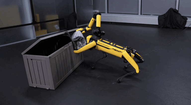 Spot quadruped robot places blanket in a deck box